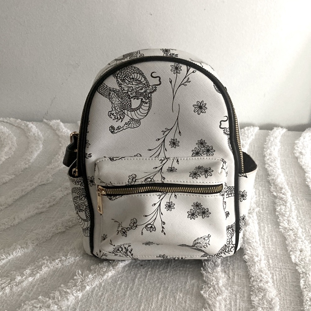 White and black dragon and flower, backpack